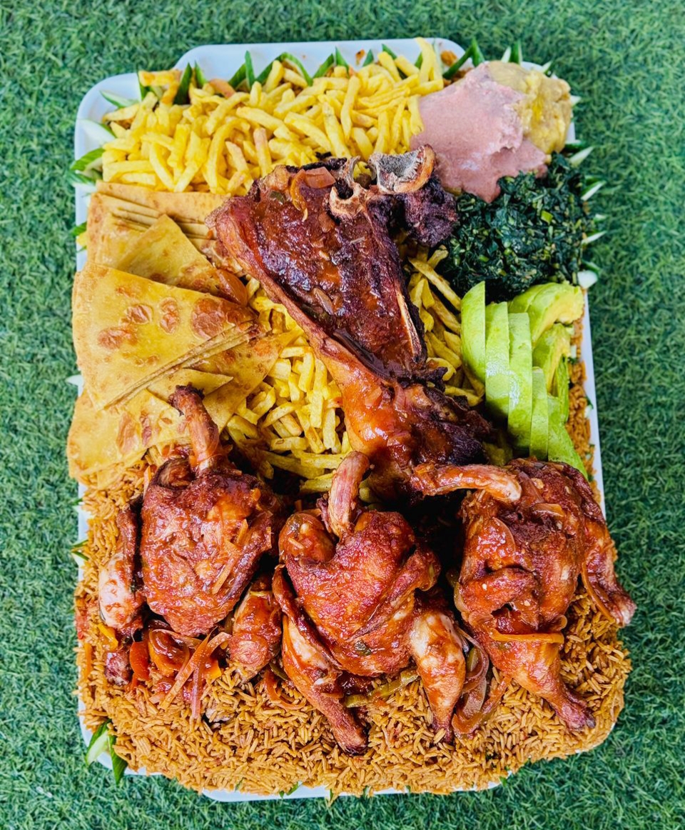 Large CK Chicken Lusaniya sharing platter with chicken, chips and pilau
